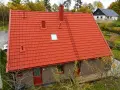Nytt tak på 200 kvm. Takbyte 200 kvm pris kan variera, men detta röda tegeltak ser gediget ut.