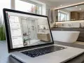 Dator visar en 3D-planering av ett modernt badrum med dusch och badkar. En jordfelsbrytare badrum är en viktig säkerhetsdetalj.
