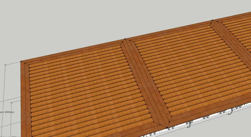 En vy av ett tak med träpanel, en fris trall som löper längs kanten.